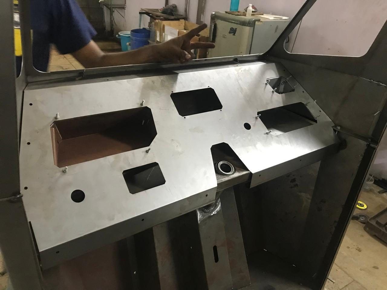 Sheet-metal dashboard mock-up with cut-outs