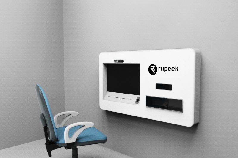 Render of a white wall-mounted Rupeek unit with a chair in front